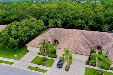 CHARMING VILLA IN VENETIAN FALLS! A VERY UNIQUE SETTING WITH on The Venice Golf and Country Club in Florida - for sale on GolfHomes.com, golf home, golf lot