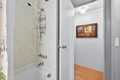 Charming 2-Bedroom Home with Co-op Share in Active 55+ on Lakes at Leesburg Golf Course in Florida - for sale on GolfHomes.com, golf home, golf lot