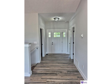 This one is a MUST SEE!  Contemporary Home with an Open Floor on Lincoln Trail Country Club in Kentucky - for sale on GolfHomes.com, golf home, golf lot