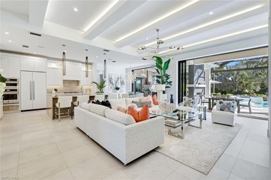 ELEVATED & LUXURIOUS This is a rare opportunity to own a on The Golf Club At Fiddlers Creek in Florida - for sale on GolfHomes.com, golf home, golf lot