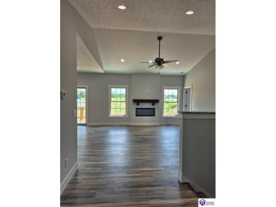 This one is a MUST SEE!  Contemporary Home with an Open Floor on Lincoln Trail Country Club in Kentucky - for sale on GolfHomes.com, golf home, golf lot