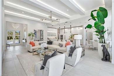 ELEVATED & LUXURIOUS This is a rare opportunity to own a on The Golf Club At Fiddlers Creek in Florida - for sale on GolfHomes.com, golf home, golf lot