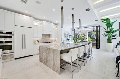 ELEVATED & LUXURIOUS This is a rare opportunity to own a on The Golf Club At Fiddlers Creek in Florida - for sale on GolfHomes.com, golf home, golf lot