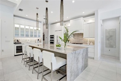 ELEVATED & LUXURIOUS This is a rare opportunity to own a on The Golf Club At Fiddlers Creek in Florida - for sale on GolfHomes.com, golf home, golf lot