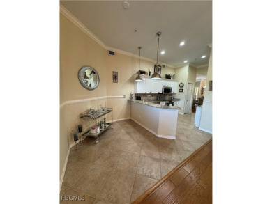 Luxurious coach home with gorgeous settings in Glen Eagle Golf on Glen Eagle Golf and Country Club in Florida - for sale on GolfHomes.com, golf home, golf lot