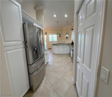 Luxurious coach home with gorgeous settings in Glen Eagle Golf on Glen Eagle Golf and Country Club in Florida - for sale on GolfHomes.com, golf home, golf lot