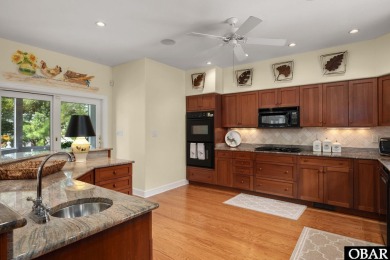 Nestled in the prestigious gated community of The Currituck Club on The Currituck Golf Club in North Carolina - for sale on GolfHomes.com, golf home, golf lot