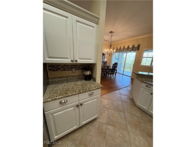 Luxurious coach home with gorgeous settings in Glen Eagle Golf on Glen Eagle Golf and Country Club in Florida - for sale on GolfHomes.com, golf home, golf lot