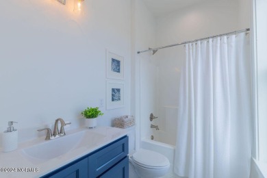 Custom home! Located in the stunning gated community of Occano on Occano Golf Course in North Carolina - for sale on GolfHomes.com, golf home, golf lot