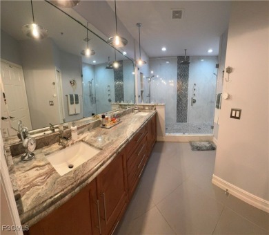 Luxurious coach home with gorgeous settings in Glen Eagle Golf on Glen Eagle Golf and Country Club in Florida - for sale on GolfHomes.com, golf home, golf lot