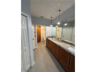 Luxurious coach home with gorgeous settings in Glen Eagle Golf on Glen Eagle Golf and Country Club in Florida - for sale on GolfHomes.com, golf home, golf lot