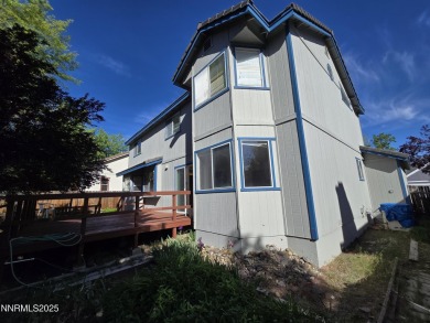 Imagine a charming two-story family home nestled in a serene on LakeRidge Golf Course in Nevada - for sale on GolfHomes.com, golf home, golf lot