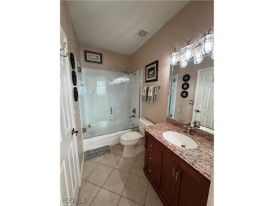 Luxurious coach home with gorgeous settings in Glen Eagle Golf on Glen Eagle Golf and Country Club in Florida - for sale on GolfHomes.com, golf home, golf lot