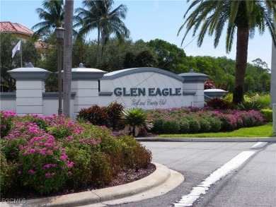 Luxurious coach home with gorgeous settings in Glen Eagle Golf on Glen Eagle Golf and Country Club in Florida - for sale on GolfHomes.com, golf home, golf lot