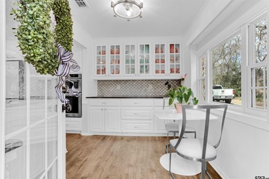 LOCATION, CHARM, AND FULL GUEST HOUSE. Nestled at the end of a on Hide-A-Way Lake Golf Course in Texas - for sale on GolfHomes.com, golf home, golf lot