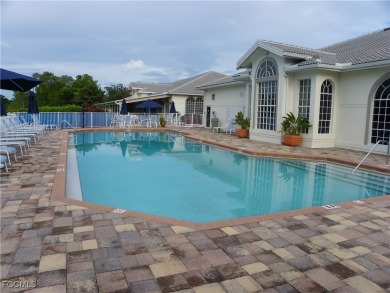 Luxurious coach home with gorgeous settings in Glen Eagle Golf on Glen Eagle Golf and Country Club in Florida - for sale on GolfHomes.com, golf home, golf lot