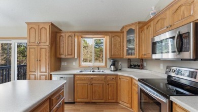 Step from your backyard to Hole 11 at Oak Hill Golf Course! This on Oak Hill Golf Club in Minnesota - for sale on GolfHomes.com, golf home, golf lot