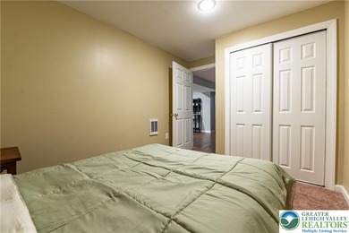 Stunning 6-bed, 4.5-bath brick-front Colonial nestled in on Caesars Pocono Palace Resort in Pennsylvania - for sale on GolfHomes.com, golf home, golf lot