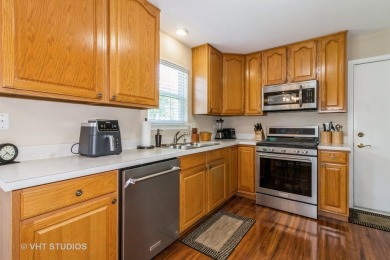 Discover this well-maintained Cartier model ranch in the 55+ on The Links at Carillon in Illinois - for sale on GolfHomes.com, golf home, golf lot