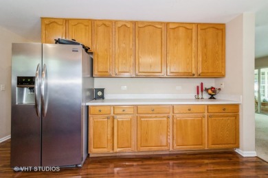 Discover this well-maintained Cartier model ranch in the 55+ on The Links at Carillon in Illinois - for sale on GolfHomes.com, golf home, golf lot