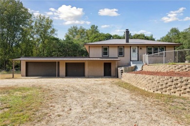 Bring your toys and projects to this outstanding property on Majestic Oaks Golf Club  in Minnesota - for sale on GolfHomes.com, golf home, golf lot