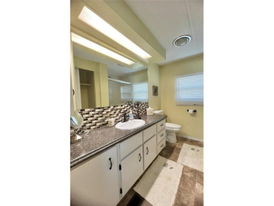 If you're looking for the perfect open-concept home with a on Fairway Village Golf Course in Florida - for sale on GolfHomes.com, golf home, golf lot