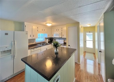 If you're looking for the perfect open-concept home with a on Fairway Village Golf Course in Florida - for sale on GolfHomes.com, golf home, golf lot