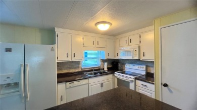 If you're looking for the perfect open-concept home with a on Fairway Village Golf Course in Florida - for sale on GolfHomes.com, golf home, golf lot