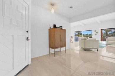 Prepare to be captivated by this exceptional, fully remodeled on Rams Hill Golf Club in California - for sale on GolfHomes.com, golf home, golf lot