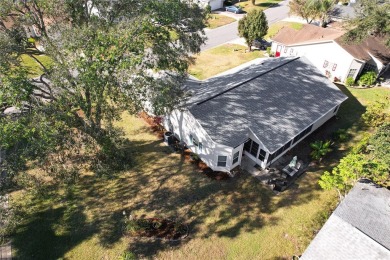 This stunning corner-lot home in Tara View Village is a true gem on Plantation Golf Club in Florida - for sale on GolfHomes.com, golf home, golf lot