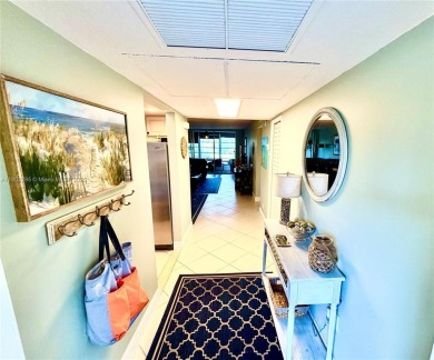 Welcome home to this warm and inviting, FULLY FURNISHED TURNKEY on Palm-Aire Country Club and Resort - Palms in Florida - for sale on GolfHomes.com, golf home, golf lot
