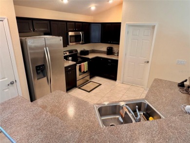 This beautifully maintained and move-in ready Iris Designer home on The Links of Spruce Creek in Florida - for sale on GolfHomes.com, golf home, golf lot