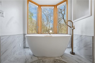 Welcome to The Huskins Home offering you a blend of comfort on Bella Vista Country Club - Highlands in Arkansas - for sale on GolfHomes.com, golf home, golf lot