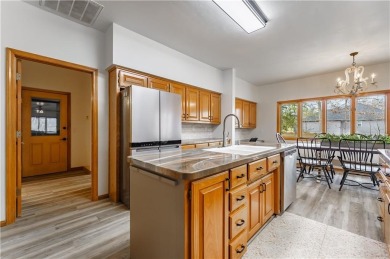 Welcome to The Huskins Home offering you a blend of comfort on Bella Vista Country Club - Highlands in Arkansas - for sale on GolfHomes.com, golf home, golf lot
