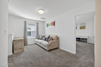 Discover your new light, bright, and delightfully modern on LPGA International Golf Course in Florida - for sale on GolfHomes.com, golf home, golf lot