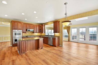 Prepare to be captivated by this remarkable brick Colonial home on Hawthorn Woods Country Club in Illinois - for sale on GolfHomes.com, golf home, golf lot
