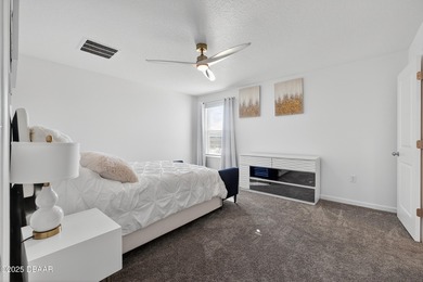 Discover your new light, bright, and delightfully modern on LPGA International Golf Course in Florida - for sale on GolfHomes.com, golf home, golf lot