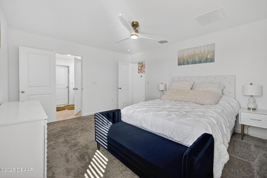 Discover your new light, bright, and delightfully modern on LPGA International Golf Course in Florida - for sale on GolfHomes.com, golf home, golf lot