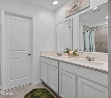 Discover your new light, bright, and delightfully modern on LPGA International Golf Course in Florida - for sale on GolfHomes.com, golf home, golf lot