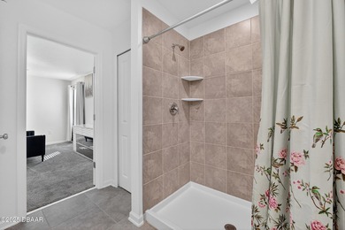 Discover your new light, bright, and delightfully modern on LPGA International Golf Course in Florida - for sale on GolfHomes.com, golf home, golf lot