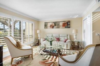 Enjoy picturesque views of the lush golf course and serene on Quail Ridge Golf Course and Country Club in Florida - for sale on GolfHomes.com, golf home, golf lot