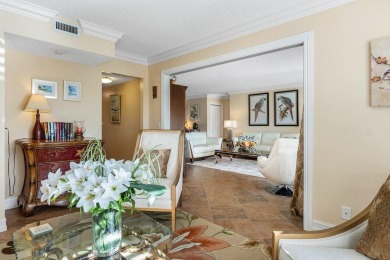 Enjoy picturesque views of the lush golf course and serene on Quail Ridge Golf Course and Country Club in Florida - for sale on GolfHomes.com, golf home, golf lot