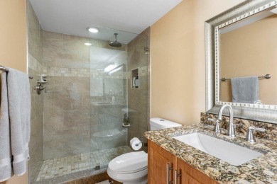 Enjoy picturesque views of the lush golf course and serene on Quail Ridge Golf Course and Country Club in Florida - for sale on GolfHomes.com, golf home, golf lot