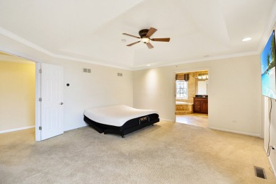 Prepare to be captivated by this remarkable brick Colonial home on Hawthorn Woods Country Club in Illinois - for sale on GolfHomes.com, golf home, golf lot