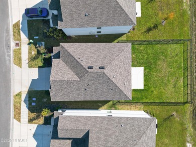 Discover your new light, bright, and delightfully modern on LPGA International Golf Course in Florida - for sale on GolfHomes.com, golf home, golf lot