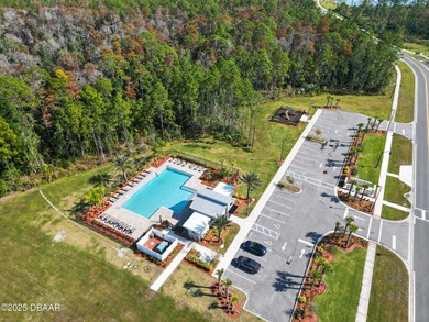Discover your new light, bright, and delightfully modern on LPGA International Golf Course in Florida - for sale on GolfHomes.com, golf home, golf lot