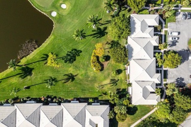 Enjoy picturesque views of the lush golf course and serene on Quail Ridge Golf Course and Country Club in Florida - for sale on GolfHomes.com, golf home, golf lot