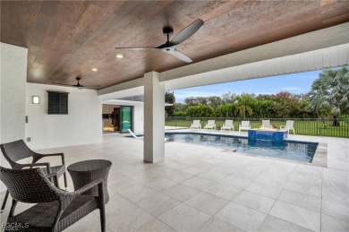 Modern Elegance Meets Florida Living in Imperial Golf Estates! on Imperial Golf Club in Florida - for sale on GolfHomes.com, golf home, golf lot