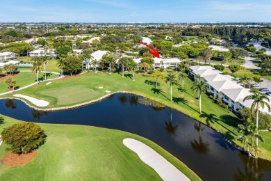 Enjoy picturesque views of the lush golf course and serene on Quail Ridge Golf Course and Country Club in Florida - for sale on GolfHomes.com, golf home, golf lot