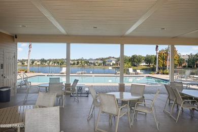 Discover your new light, bright, and delightfully modern on LPGA International Golf Course in Florida - for sale on GolfHomes.com, golf home, golf lot